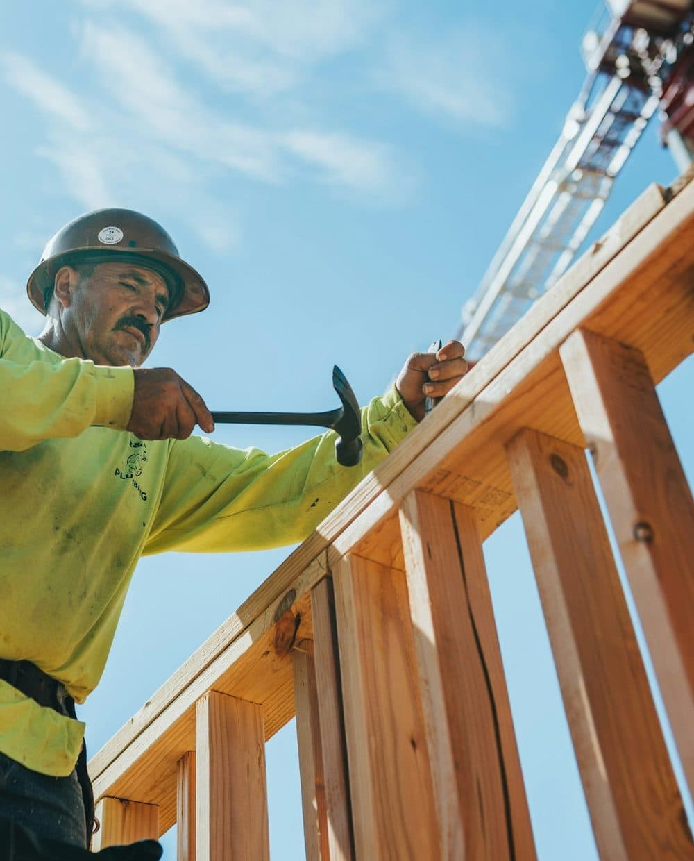 A Local Roof Repair & Siding crew member on the job